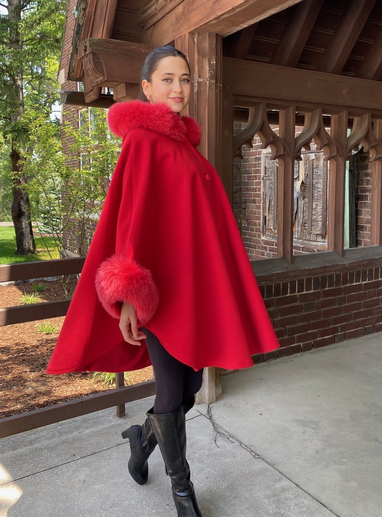 Fur hooded cape on sale